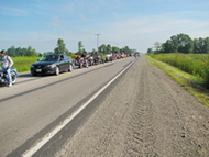 Line up behind when stopped on approach to Hagersville before reaching town as bikes ahead hit the town lights, 20 miles to go.