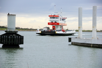 One of the Galveston Ferry's, ran by the Texas DOT arriving to port.