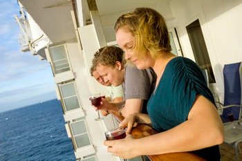 A little wine on the balcony as we depart Cozumel and watch the skies clearing.