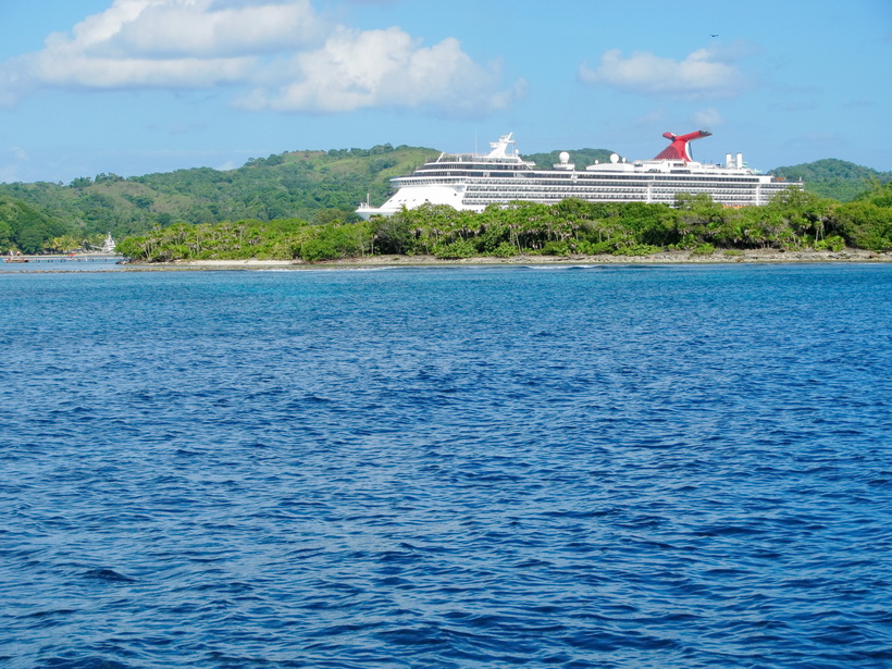 Carnival Cruise ship at the dock in Mohognay Bay, Roatan, Honduras.