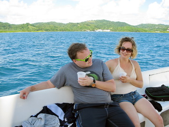 A drink and a cruise along the Roatan Coastline after snorkeling with Jolly Rogers Snorkeling.