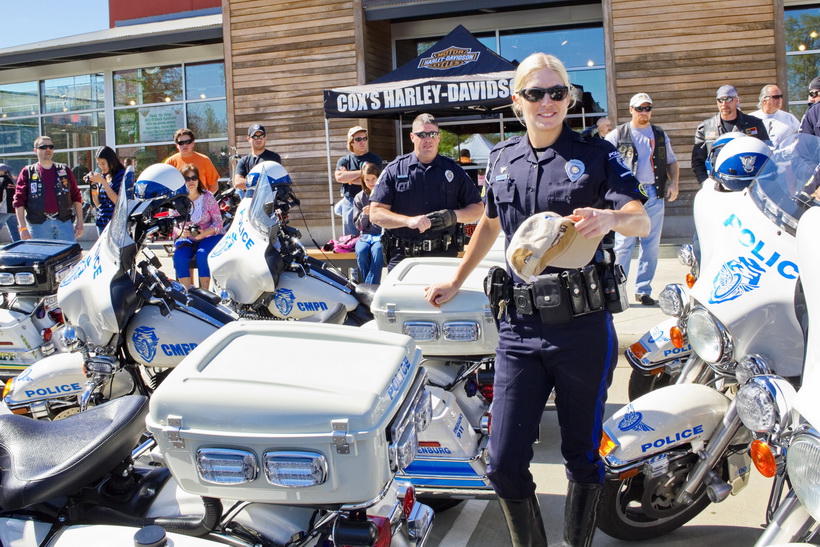 Amanda Cater, Charlotte Mecklenburg Police Department, motorcycle squad officer getting ready to assist on the escorted Thin Blue Line Ride.