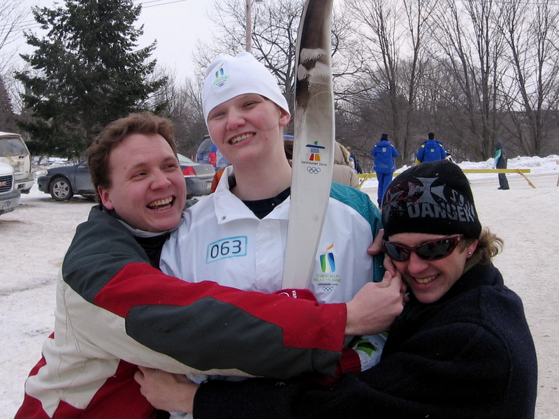 Carrie Rawlins, carrying the Torch through Midland, ON.